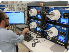A meter tech using the WECO 8030 in a shop.