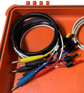 A Verification Current Cable used to connect the 6618A and the RX-10/RX-11/RX-15/RX-30/RX-31/RX-33